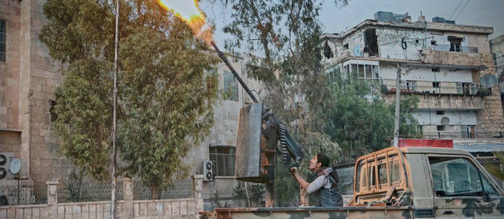Rebel inside Aleppo city fires at planes overhead